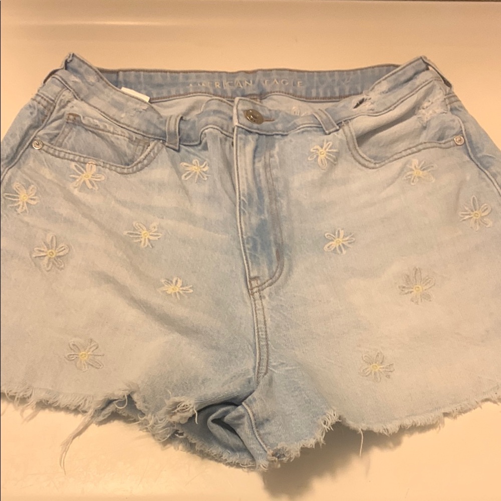 American Eagle Outfitters Blue Jean Shorts Distressed Style with daisy print.